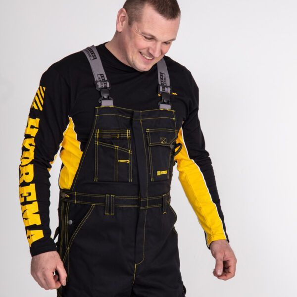 man in hydrema overalls and t-shirt